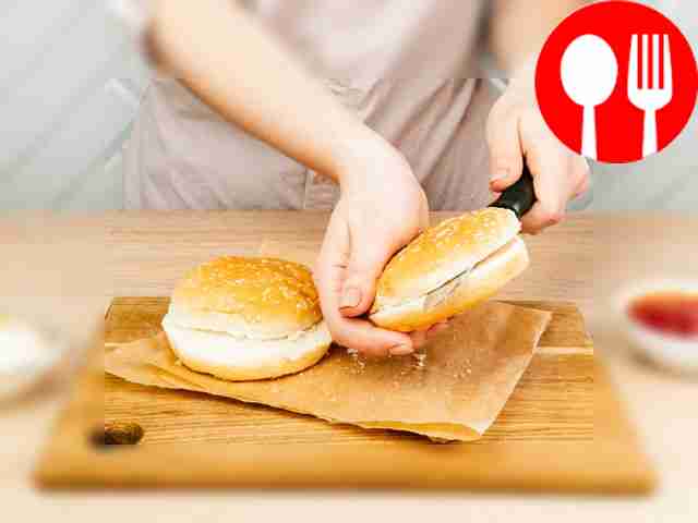 Carefully cut each bun into two pieces.
