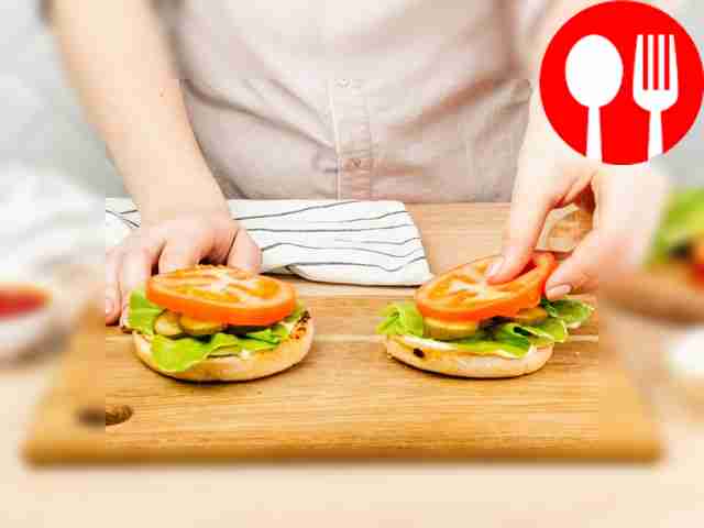 Start assembling the burger. Place the bottoms...