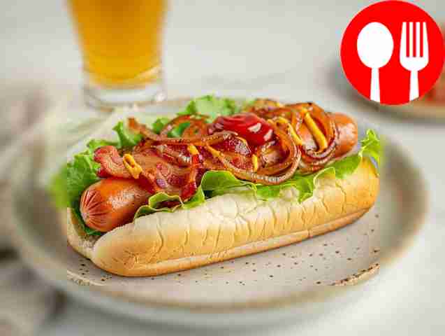Hearty hot dog with bacon and caramelized onions