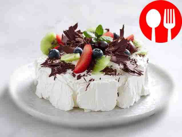 Creamy ice cream cake with meringue
