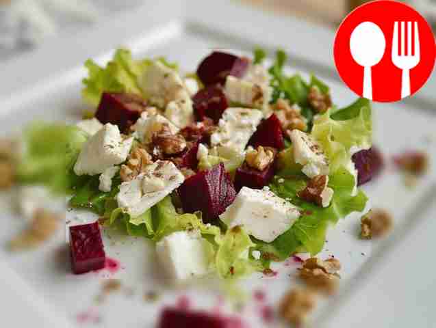 Beetroot salad with cheese, nuts and herbs
