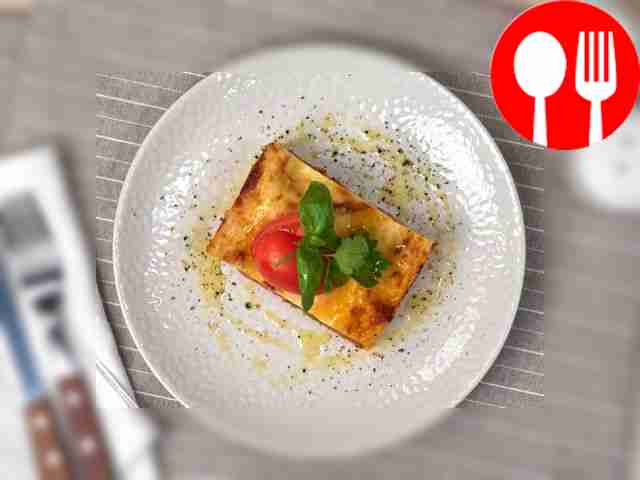 Before serving, sprinkle lasagne portions with...