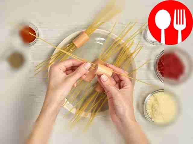 Boil sausages with spaghetti. Poke a few...