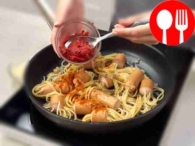 Stew noodles with onions in tomato sauce....