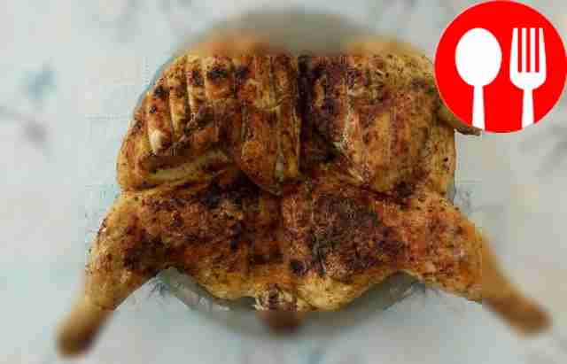 Chicken on the grill with smoke