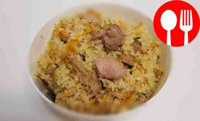 Fragrant pork pilaf with carrots and onions