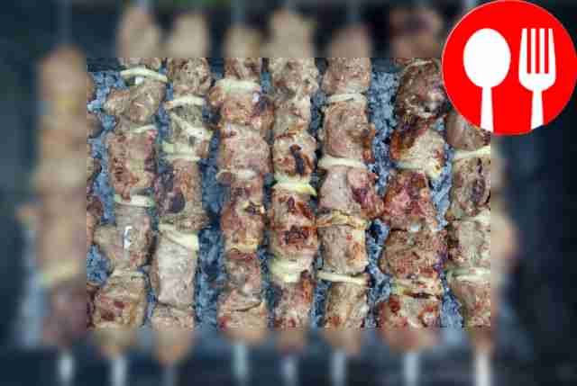 Thread the marinated meat onto skewers mixed...