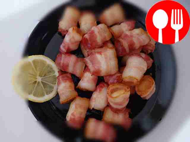 Tender scallops in bacon with lemon