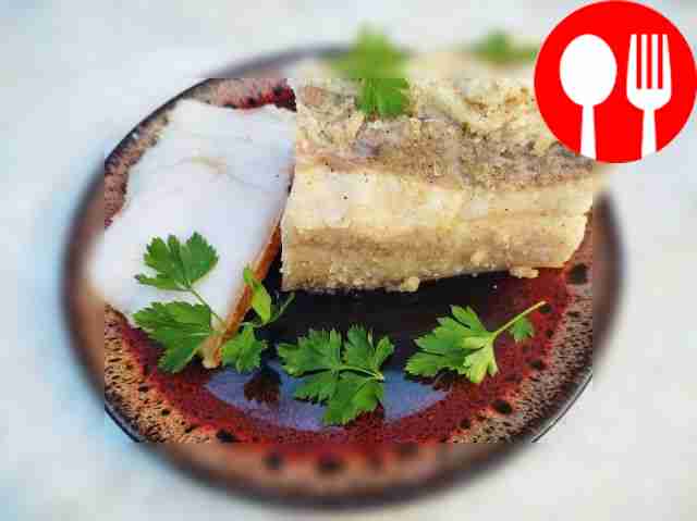 Serve lard as canapés. Place a slice of black...