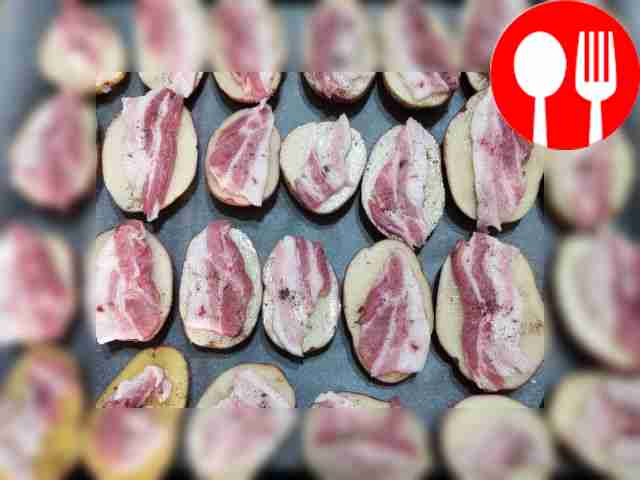 Place the potatoes on a baking sheet lined...