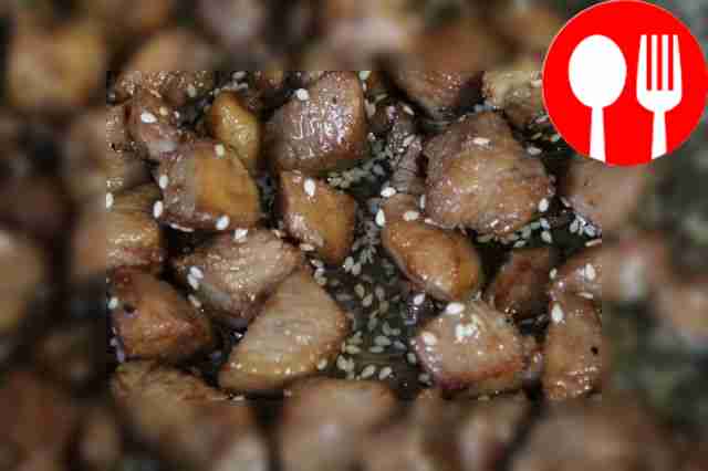 Heat a frying pan over heat, pour in sunflower...