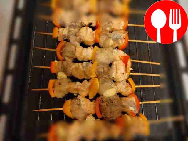 Spicy trout skewers with camembert and sweet pepper