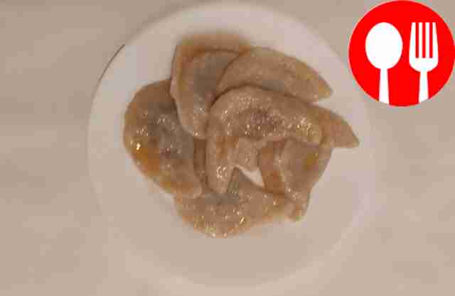 Праздничные вареники с тушеной капустой