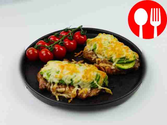 Pork with avocado under cheese cap