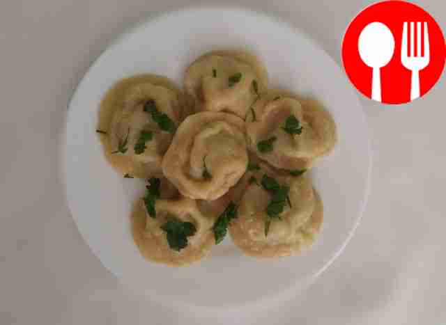 Serve the dumplings hot with sour cream or...