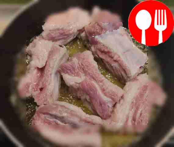 Cut the pork ribs into portions and fry. Add...