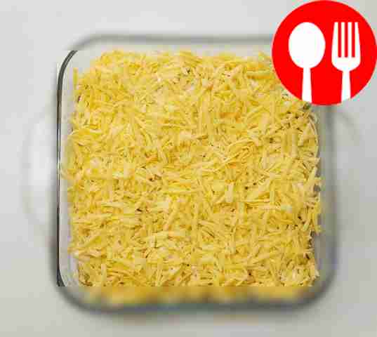 Sprinkle grated cheese on top. Place the pan...