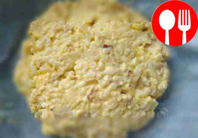 Place the rice mixture into the mold. Salmon...