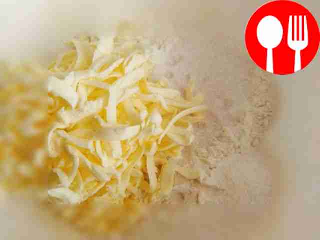 Add sugar to sifted flour. Grate the butter....