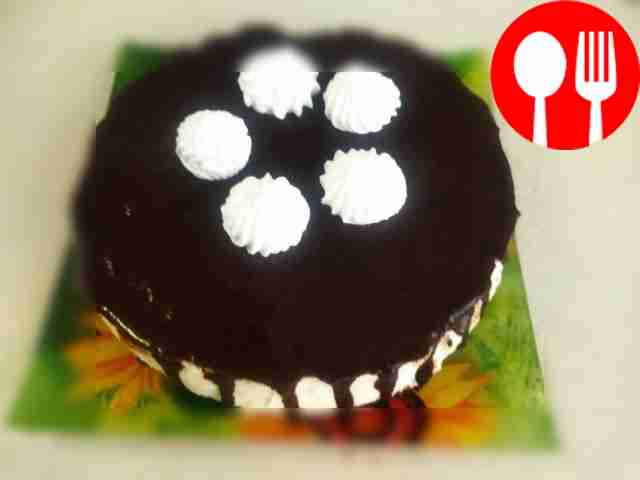 Serve the soufflé topped with glaze. Garnish...