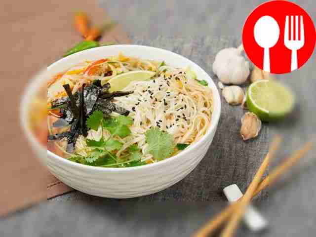 Serve ramen over noodles, sprinkled with sesame seeds.
