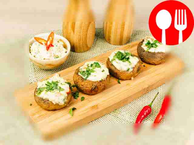 Stuffed champignons with suluguni, garlic and chili