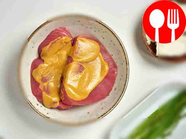 Marinate the steaks. Coat tuna steaks with...