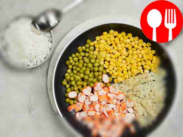 Fry vegetables and crab sticks. In a frying...