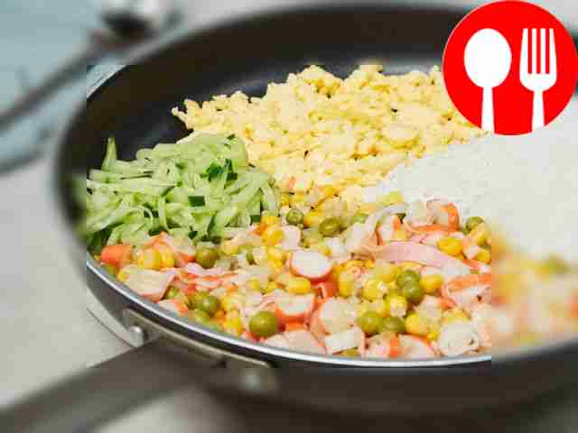 Fry the rice. Pour the rice into the pan with...