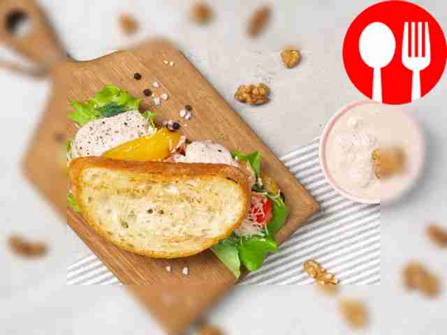 The sauce can be poured into a wooden bowl,...