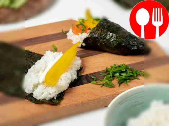 Make sushi. Cover a wooden board with cling...