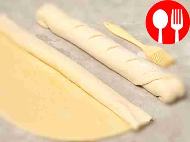 Form baguettes. Divide the dough into two...