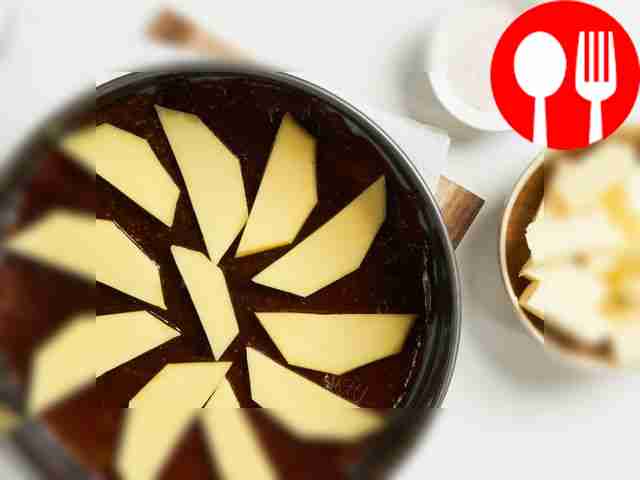 Prepare mango and caramel. Melt 2 tbsp in a...