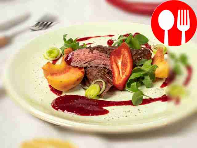 Beef steak with cranberry sauce