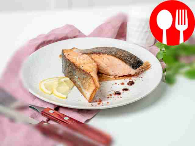 Salmon steak in a frying pan