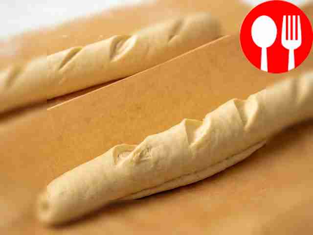Prepare baguettes for baking. Place the...