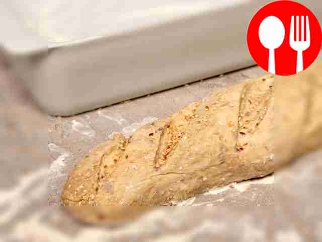 Make a quick baguette. Using wet hands, form a...