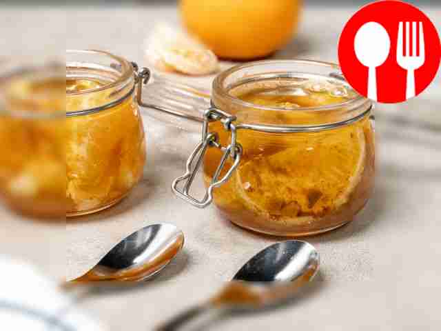 Before serving, place the tangerine slices in...