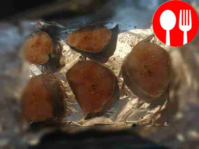 Place the cod steaks on a baking sheet, salt...