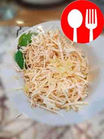 Peel the garlic and pass it through a press....