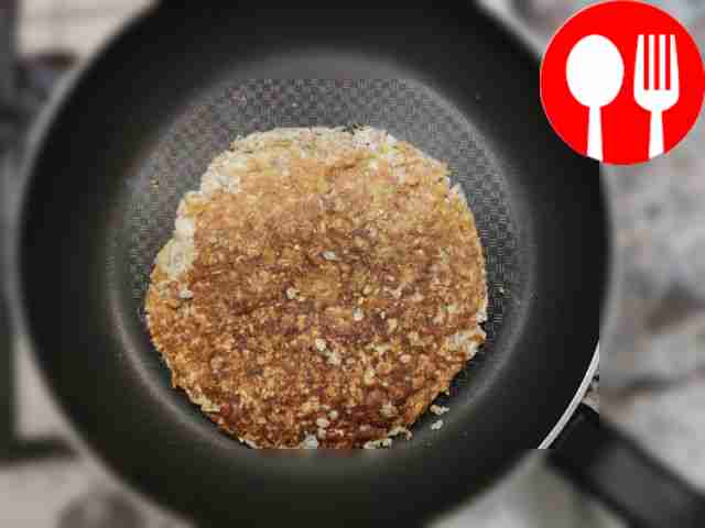 Fry the oatmeal pancake on both sides until cooked.