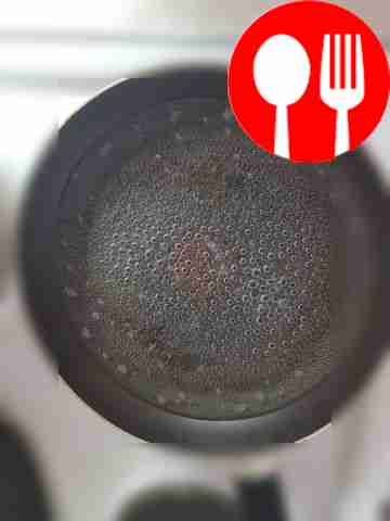 Place a frying pan with water on the stove....