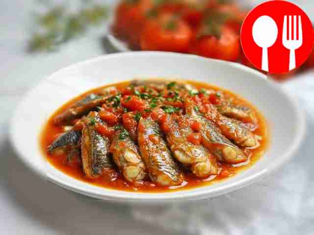 Juicy sprat in tomato in the microwave