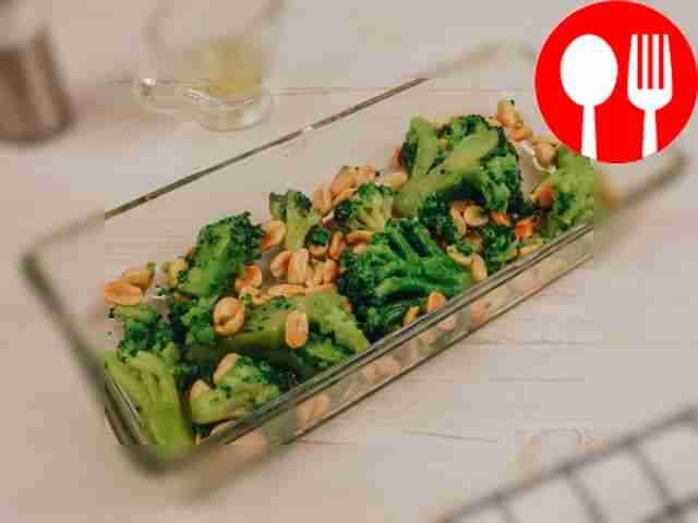 Place broccoli in a baking dish, add peanuts...