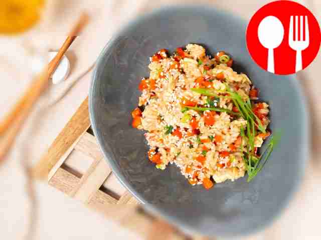 Place a portion of rice on a wide-brimmed...