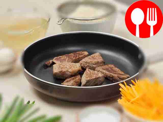 Cook the beef. Heat a dry frying pan over high...