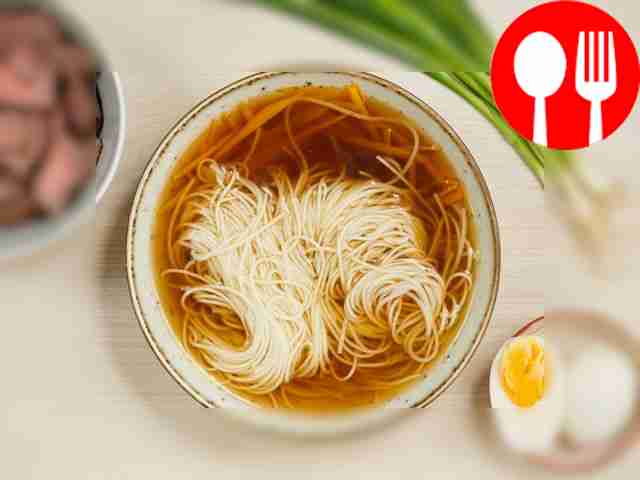 Assemble the ramen. Cut the boiled eggs in...