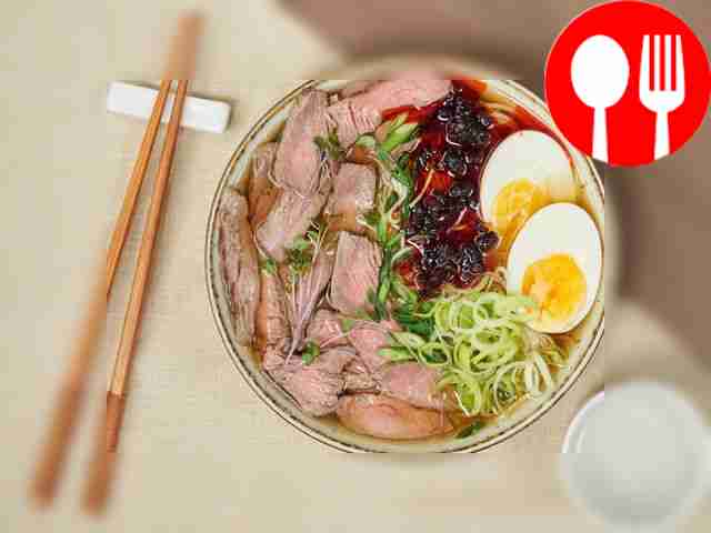 Chop the green onions coarsely. Serve ramen...