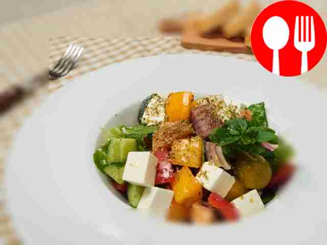 Greek salad with salmon