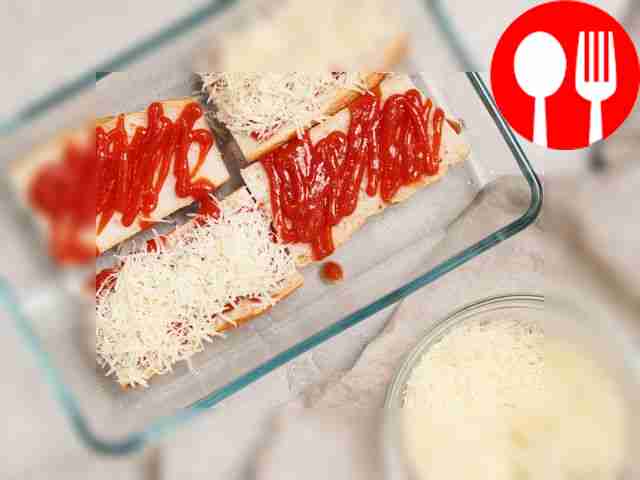 Prepare a baguette with ketchup. Spread each...